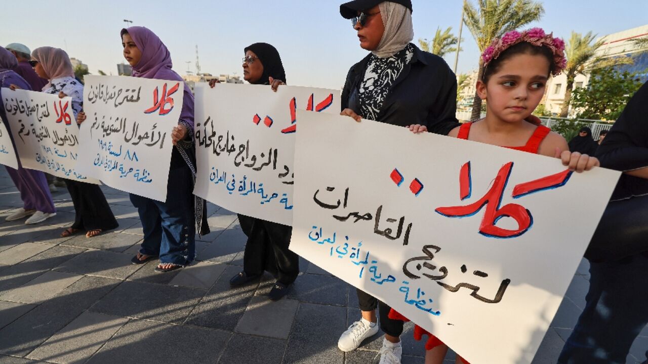 Activists in Baghdad's Tahrir Square demonstrate against female child marriage on July 28, 2024