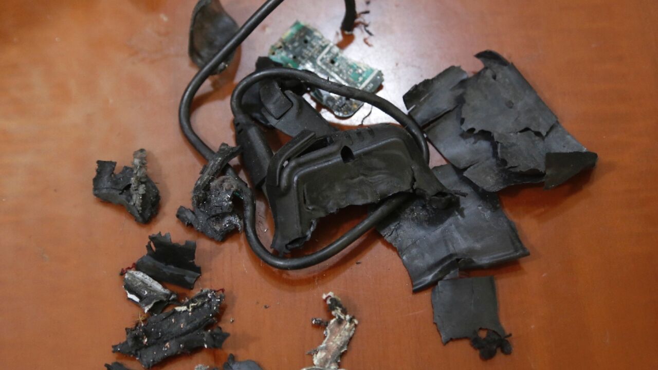 The remains of exploded Hezbollah pagers are put on display at an undisclosed location in Beirut's southern suburbs, a stronghold of the militant group