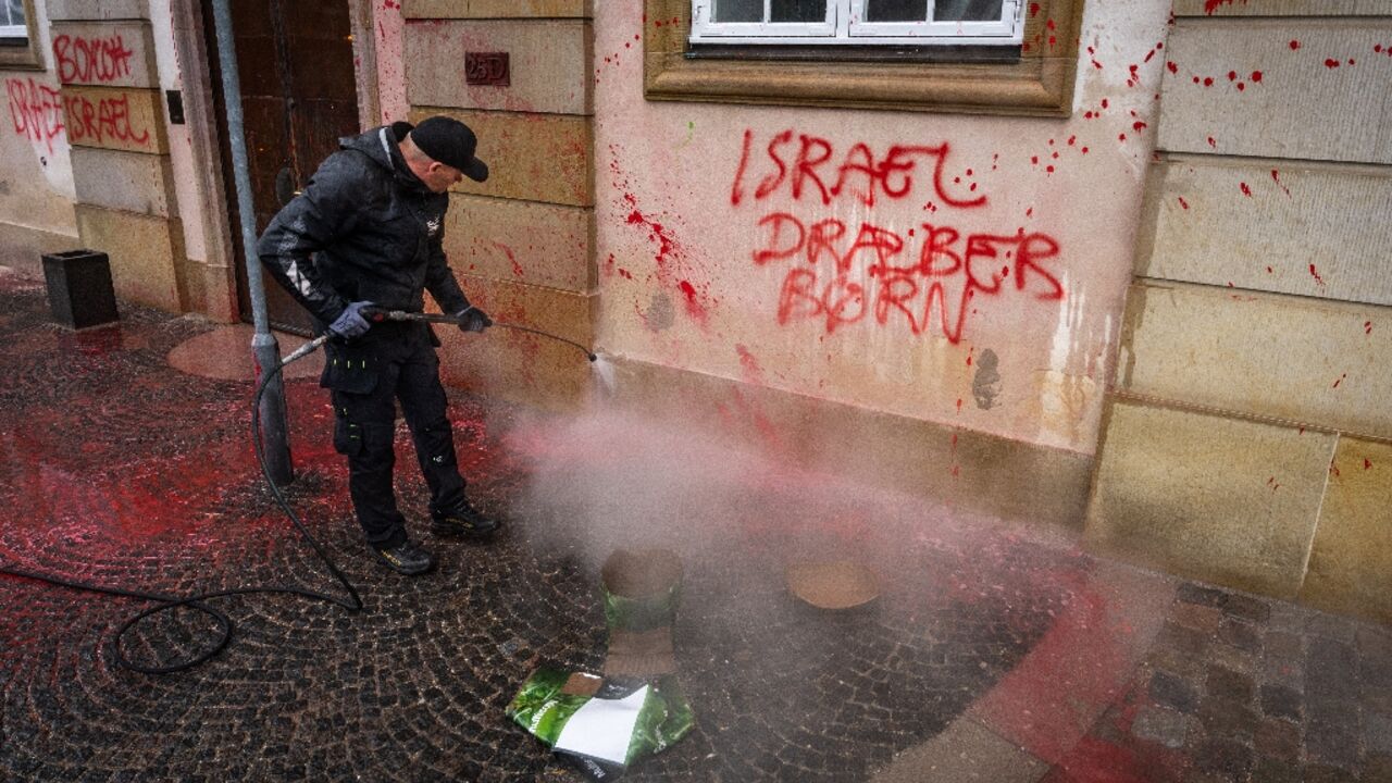 Red paint and anti-Israel slogans were spreayed on the Danish foreign ministry building in Copenhagen Red paint and anti-Israel slogans were spreayed on the Danish foreign ministry building in Copenhagen