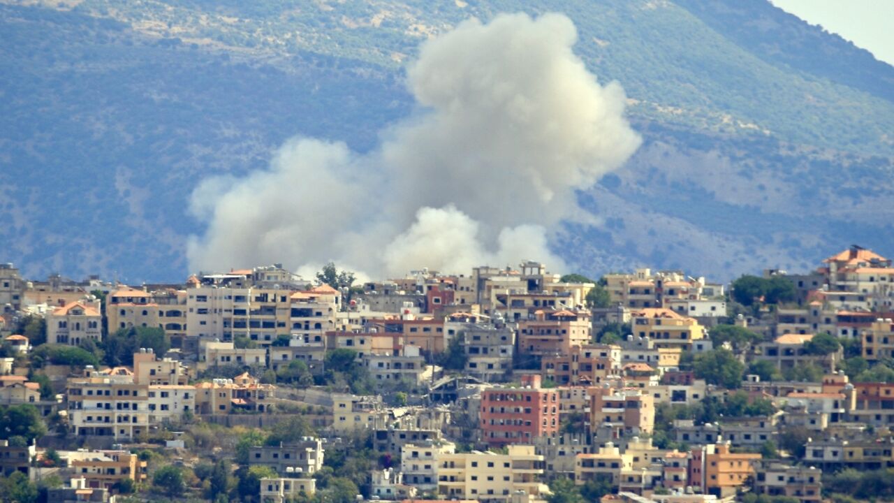 Smoke billows from the site of an Israeli airstrike in the southern Lebanese village of Khiam near the border on September 19, 2024