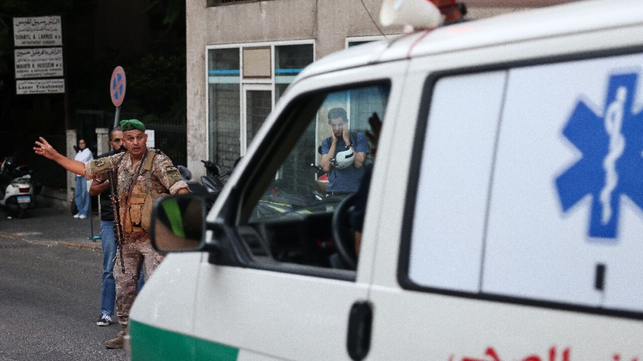 An ambulance rushes people to hospital in Beirut, after paging device explosions An ambulance rushes people to hospital in Beirut, after paging device explosions
