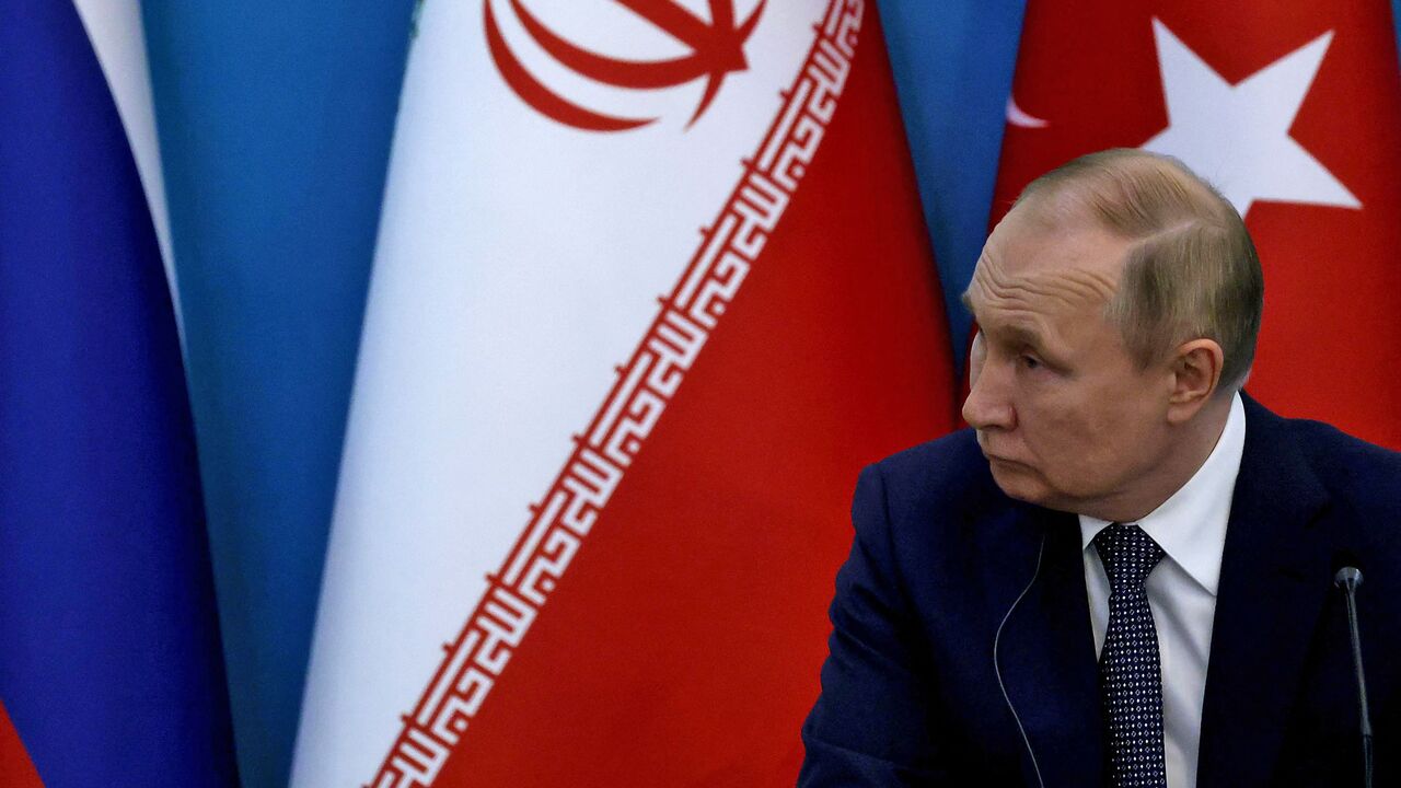 Russian President Vladimir Putin looks on during a joint press conference with his Iranian and Turkish counterparts following their summit in Tehran on July 19, 2022. (Photo by ATTA KENARE / AFP) (Photo by ATTA KENARE/AFP via Getty Images)