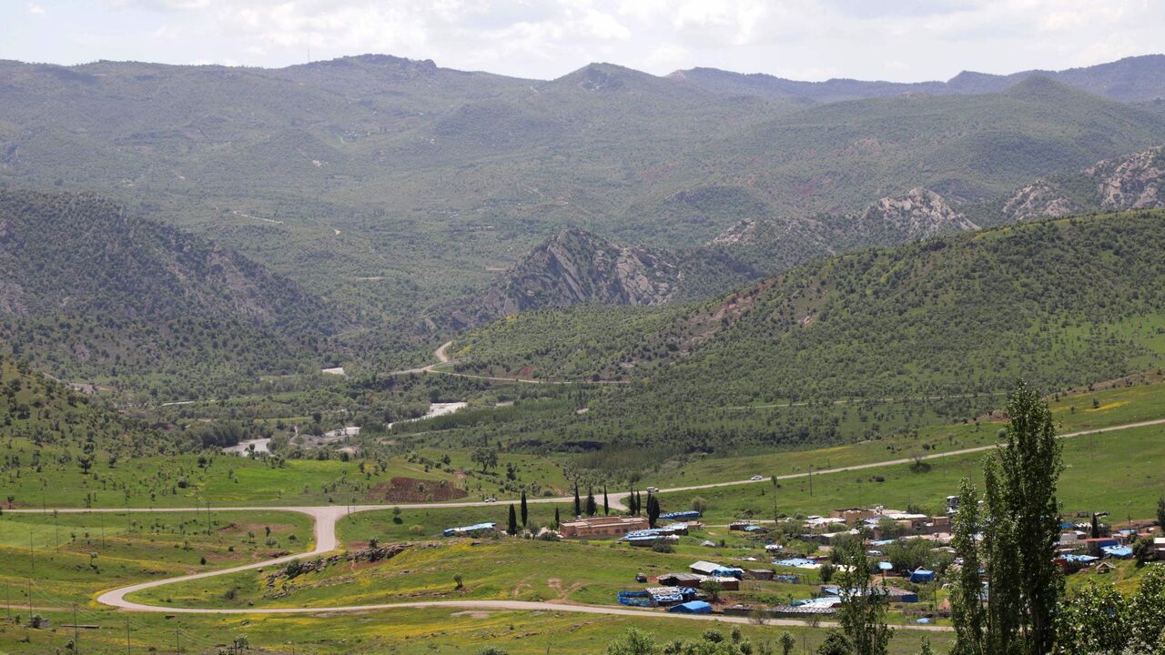 In this picture taken on April 25, 2023, mountains overlook the village of Hiror near the Turkish border in northern Iraq's autonomous Kurdish region, where firefights occur between the Turkish army and fighters from the Kurdistan Workers' Party (PKK). 