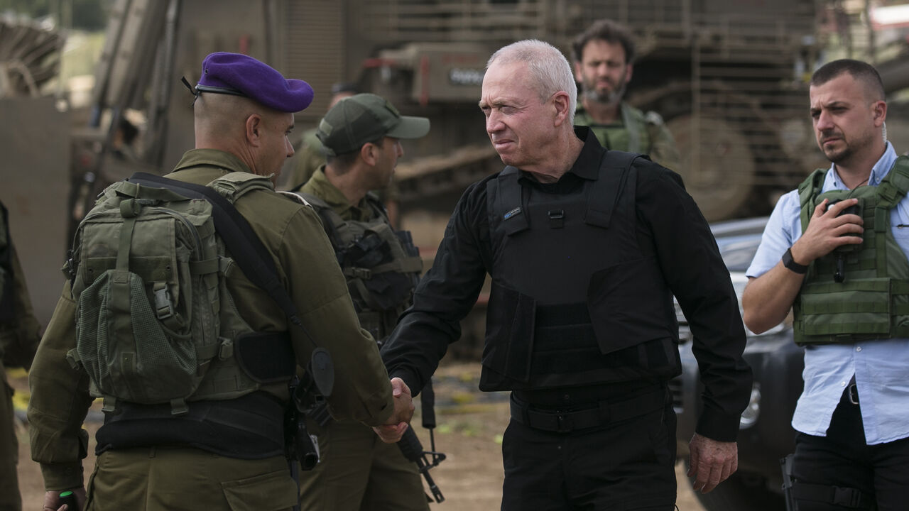 Israeli Minister of Defense Yoav Gallant meets soldiers on the Israeli border with the Gaza Strip, Sderot, Israel, Oct. 19, 2023.