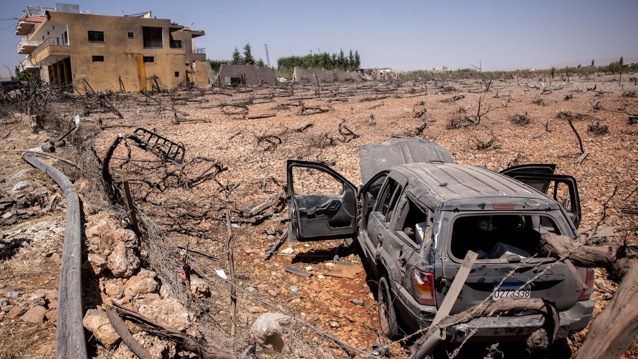 A destroyed car and apartment building are seen after an Israeli airstrike on Aug. 20 that killed one and injured fifteen others, Nabi Chit, Lebanon, Aug. 21, 2024.