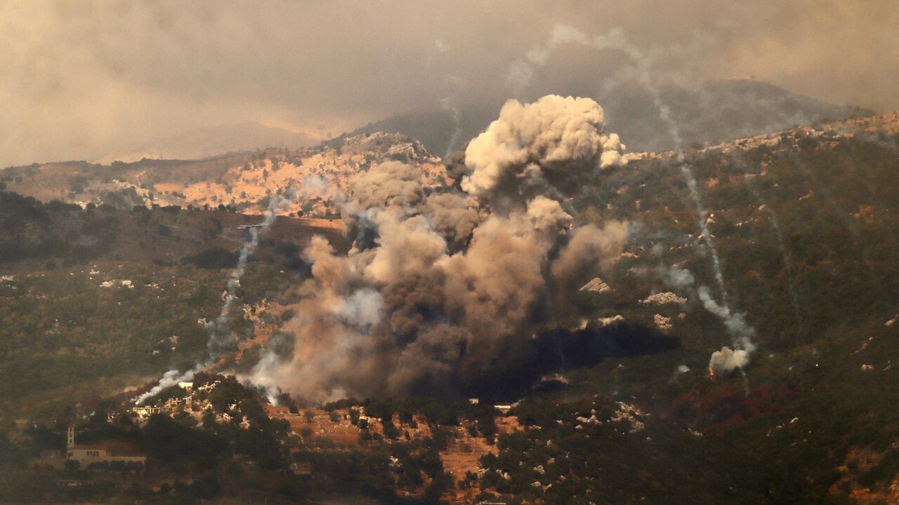 Smoke billows from the site of an Israeli strike that targeted the Jabal Al-Rehan area in the southern Lebanese Jezzine district on September 21, 2024. 