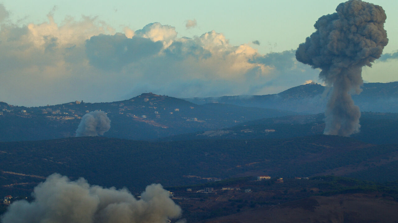 Smoke billows from the site of Israeli airstrikes in Aramti, near the Lebanon-Israel border, on Sept. 23, 2024.