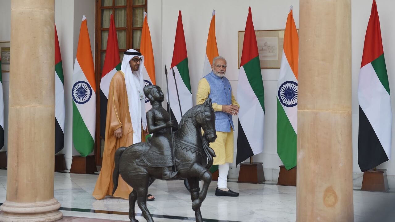 The President of UAE Mohammed Bin Zayed Al Nahyan (L) walks with Indian Prime Minister Narendra Modi ahead of a meeting in New Delhi on January 25, 2017.