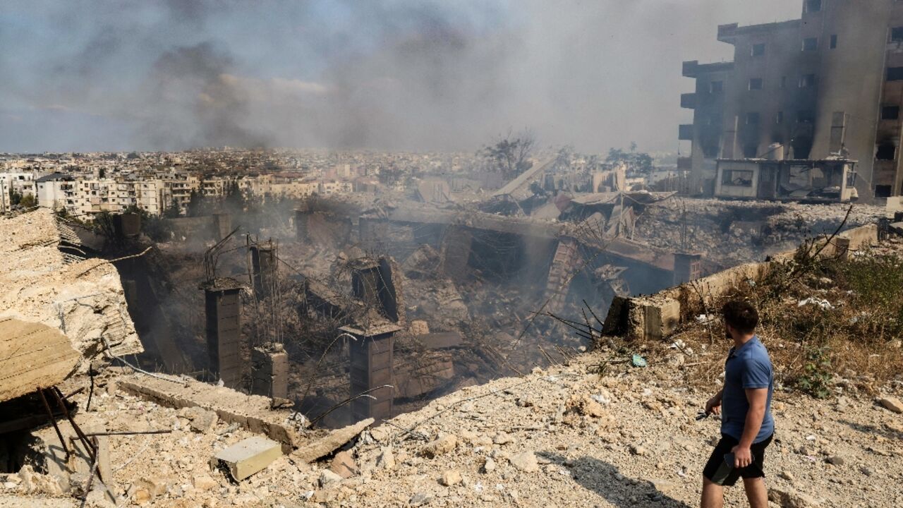 Destruction at a factory targeted in an Israeli airstrike south of Beirut Destruction at a factory targeted in an Israeli airstrike south of Beirut
