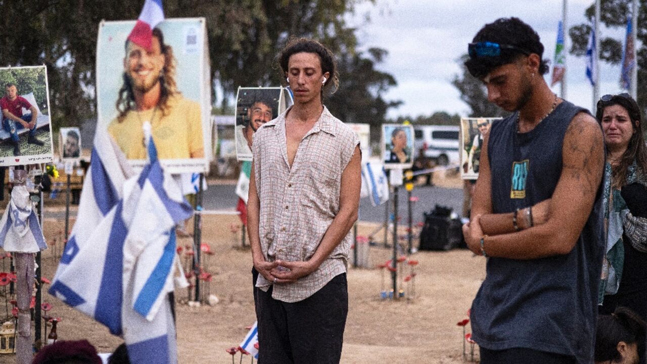 The commemorations began with a moment of silence at 6:29 am, the time the attack started, at the site of the Nova music festival The commemorations began with a moment of silence at 6:29 am, the time the attack started, at the site of the Nova music festival