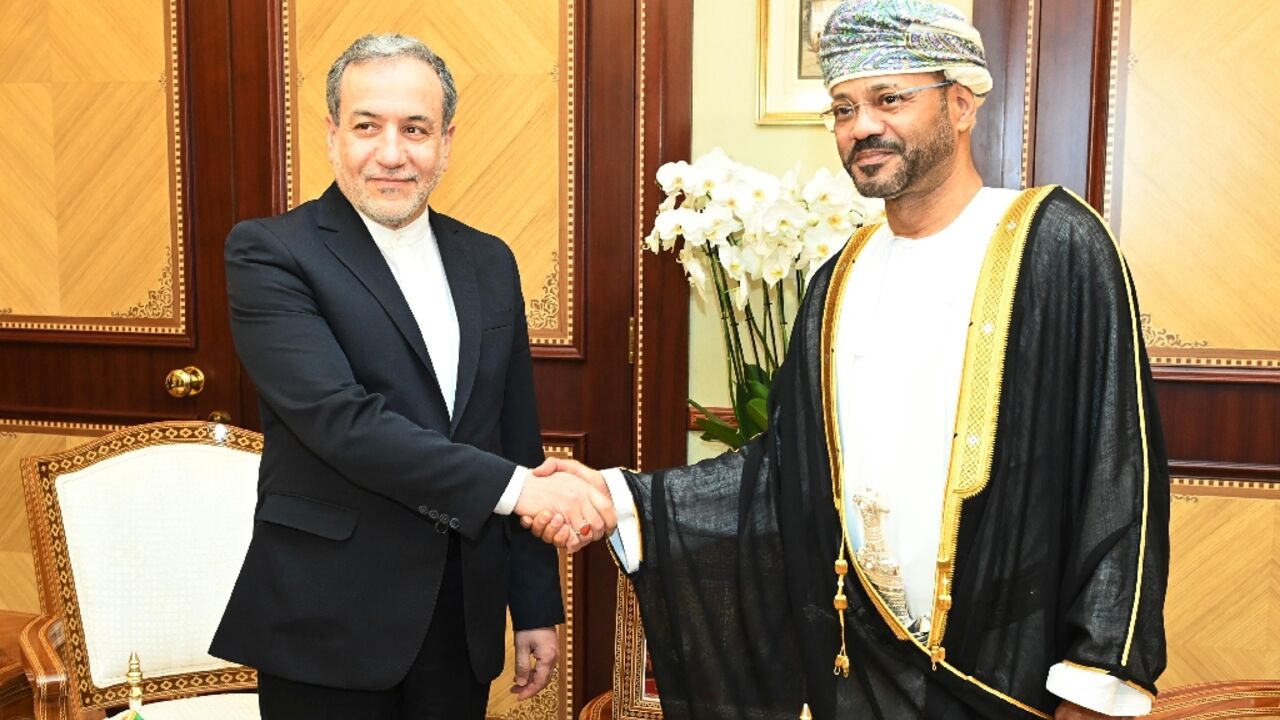 A handout picture provided by the Oman News Agency showing Oman's Foreign Minister Sayyid Badr al-Busaidi (right) receiving Iranian Foreign Minister Abbas Araghchi in Muscat A handout picture provided by the Oman News Agency showing Oman's Foreign Minister Sayyid Badr al-Busaidi (right) receiving Iranian Foreign Minister Abbas Araghchi in Muscat