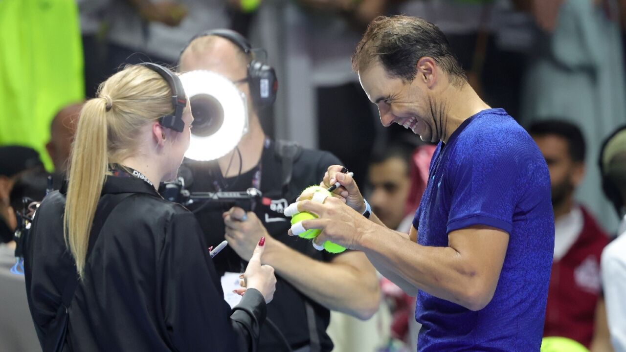'Trying to have fun': Rafael Nadal signs tennis balls after he was defeated by Carlos Alcaraz 'Trying to have fun': Rafael Nadal signs tennis balls after he was defeated by Carlos Alcaraz