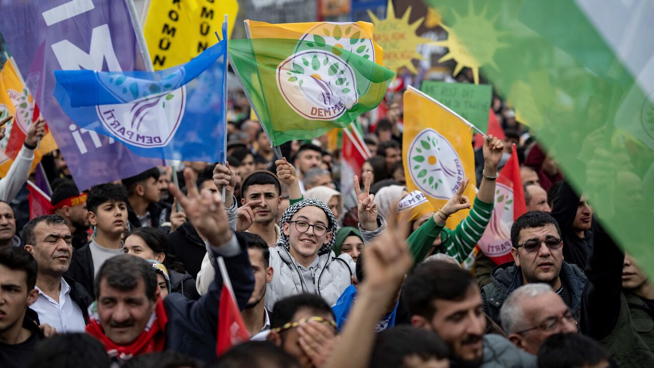 Supporters of the pro-Kurdish Peoples DEM Party attend a rally for the Turkish Municipal elections to be held on March 31, in Esenyurt Square, in Istanbul on Feb. 25, 2024. 