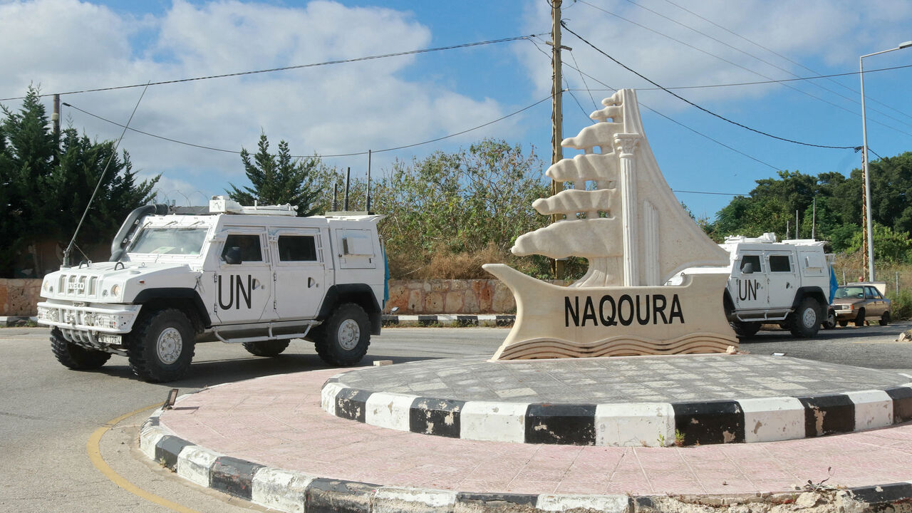 UNIFIL-armored vehicles patrol at the entrance of the southern Lebanese town of Naqoura near the border with Israel, amid ongoing cross-border clashes between Israeli troops and Hezbollah fighters, June 17, 2024.