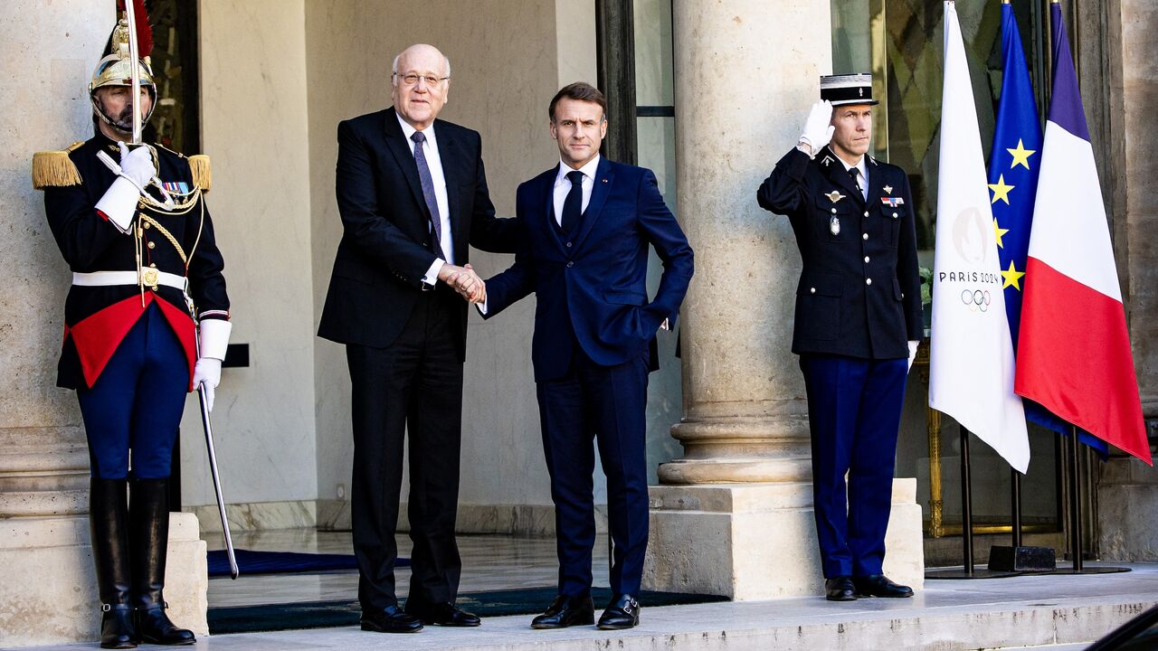 France s President Emmanuel Macron receives Lebanon's Prime Minister Najib Mikati before their bilateral meeting at the Elysee Palace in Paris, France, on Oct. 23, 2024.