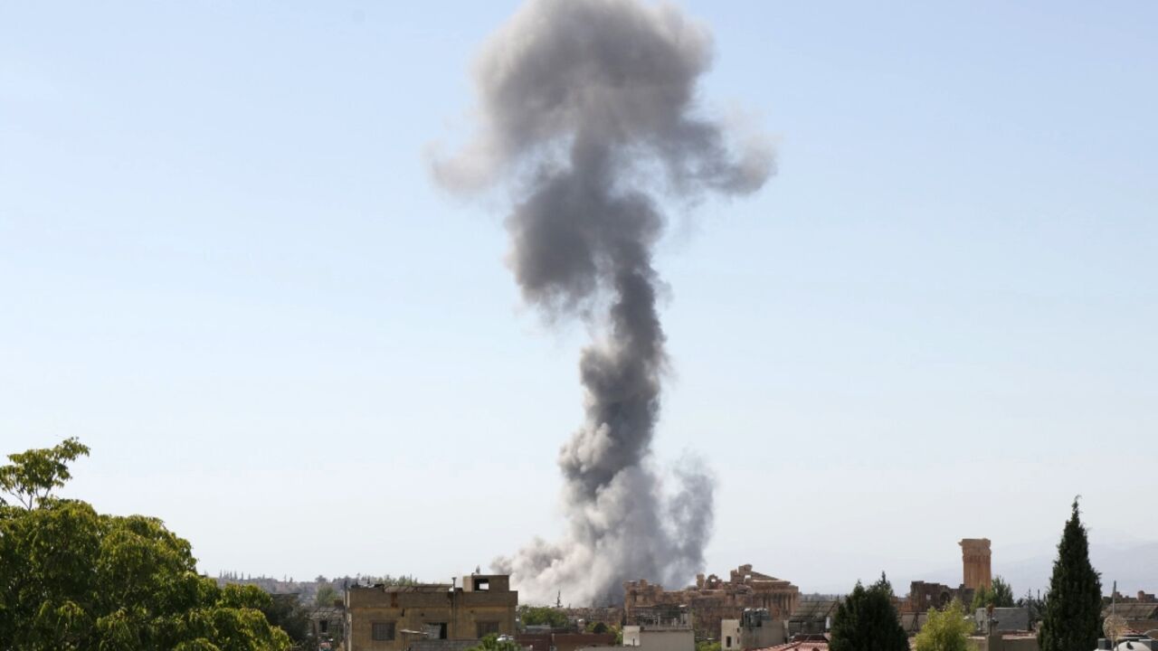 Smoke billows following an Israeli airstrike near the ruins of the ancient Roman Temple of Baachus in Lebanon's eastern city of Baalbek in the Bekaa valley Smoke billows following an Israeli airstrike near the ruins of the ancient Roman Temple of Baachus in Lebanon's eastern city of Baalbek in the Bekaa valley
