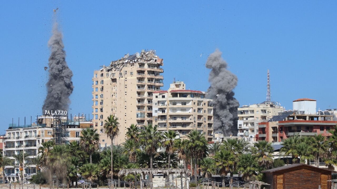 Plumes of smoke rise over the Lebanese coastal city of Tyre after Israeli air strikes