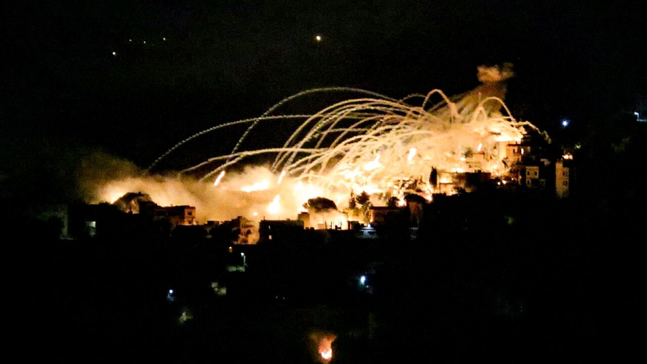 An explosion lights up the night sky over the south Lebanon town of Khiam An explosion lights up the night sky over the south Lebanon town of Khiam