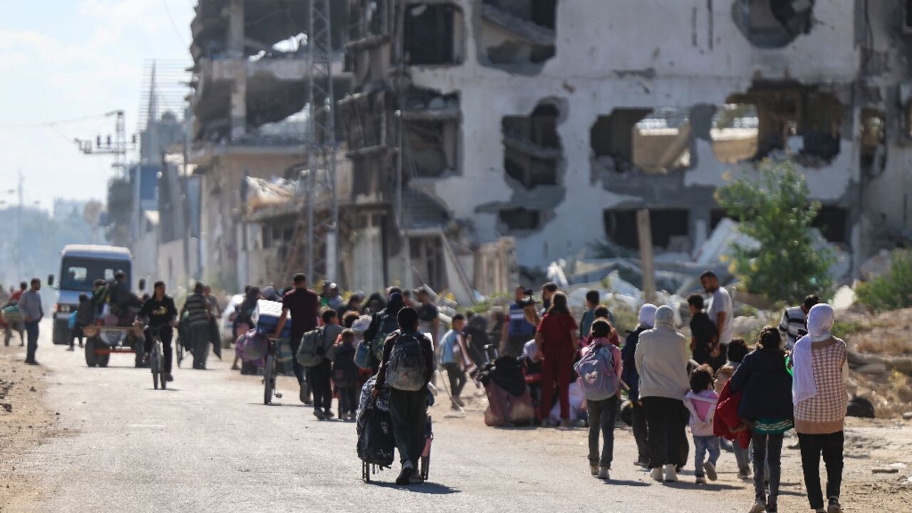 Displaced Palestinians fleeing Israeli military operations in Beit Lahia in the northern Gaza Strip