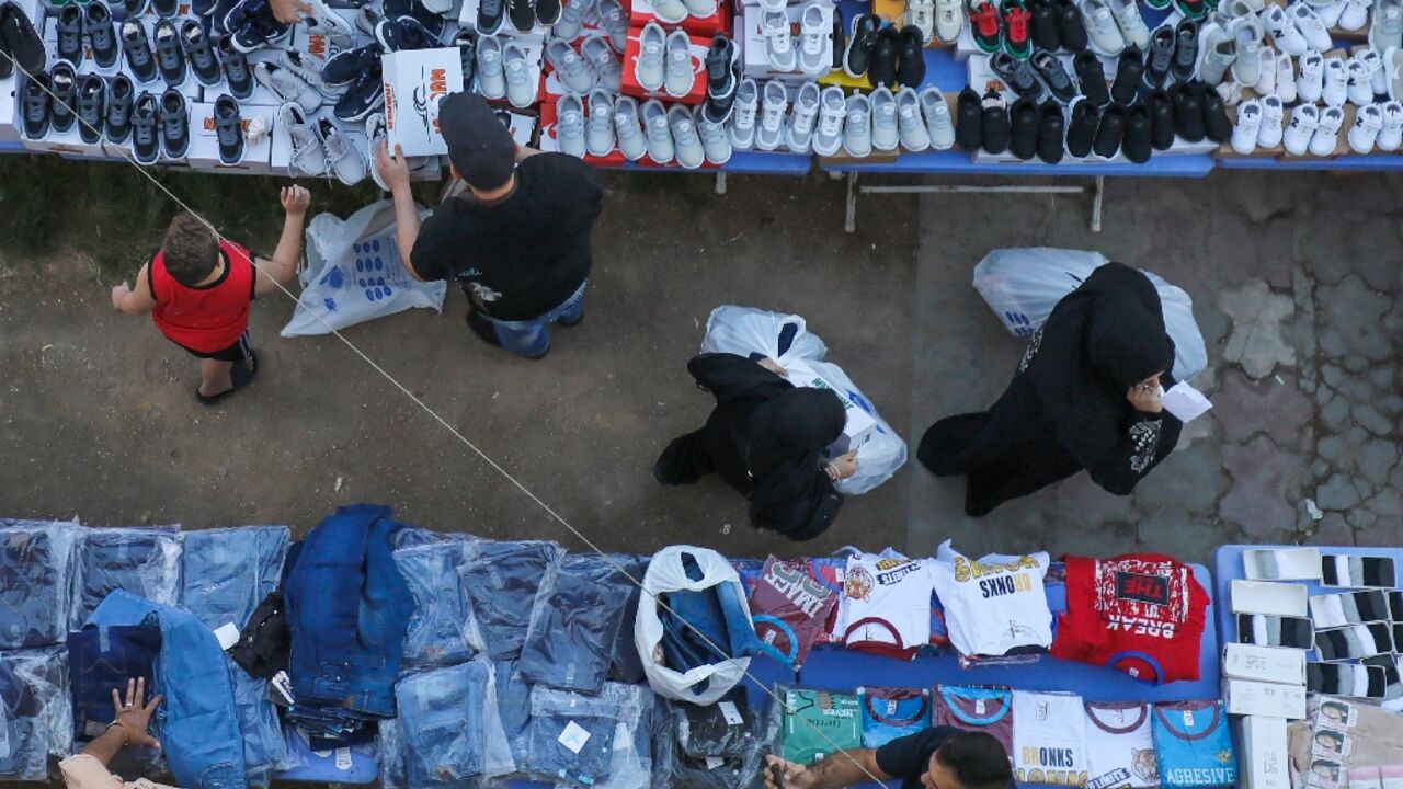 A file picture showing displaced Lebanese people who fled Israeli bombardment in their country to find shelter in Iraq