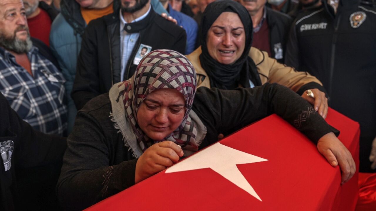 Relatives mourn victims of the PKK attack near Ankara Relatives mourn victims of the PKK attack near Ankara