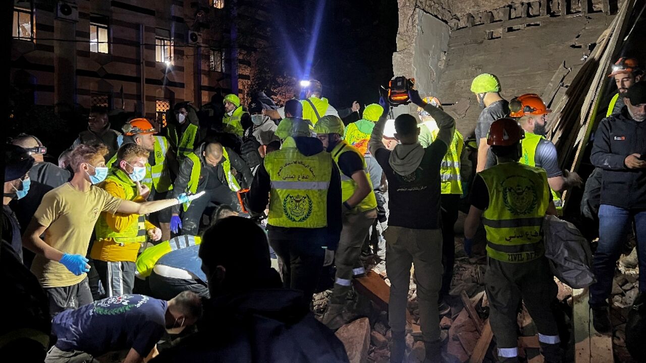 Emergency teams at the site of an Israeli strike on Beirut's Zuqaq al-Blat neighbourhood Emergency teams at the site of an Israeli strike on Beirut's Zuqaq al-Blat neighbourhood