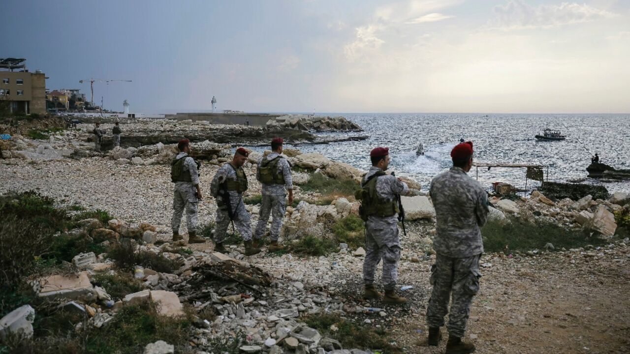 Lebanese soldiers inspect the beach where Israeli naval commandos are believed to have landed on Friday