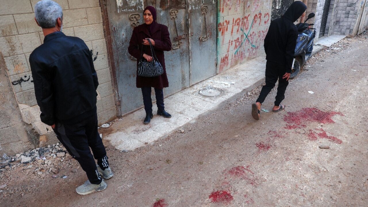 Blood stains a street in Jenin, in the occupied West Bank, following a deadly Israeli military raid