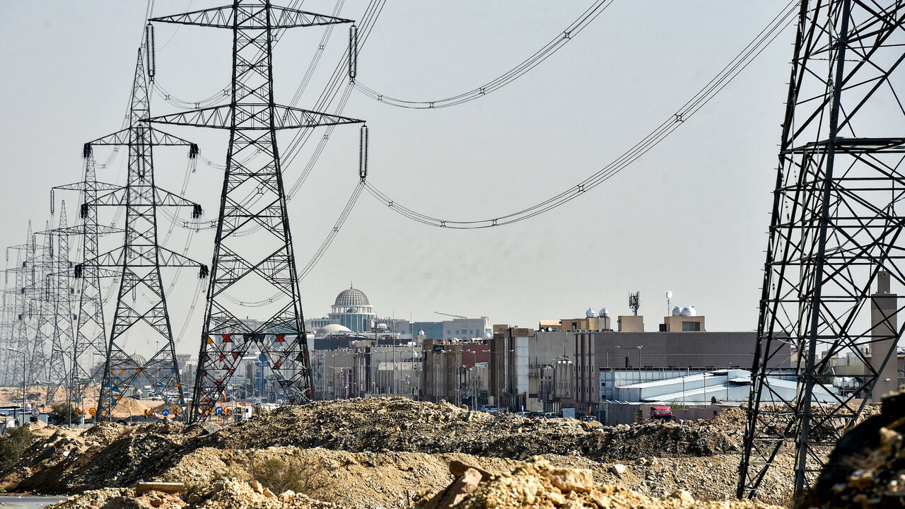 This picture taken on December 18, 2018 shows a view of electricity transmission towers in the Saudi capital Riyadh. (Photo by FAYEZ NURELDINE / AFP) (Photo by FAYEZ NURELDINE/AFP via Getty Images)