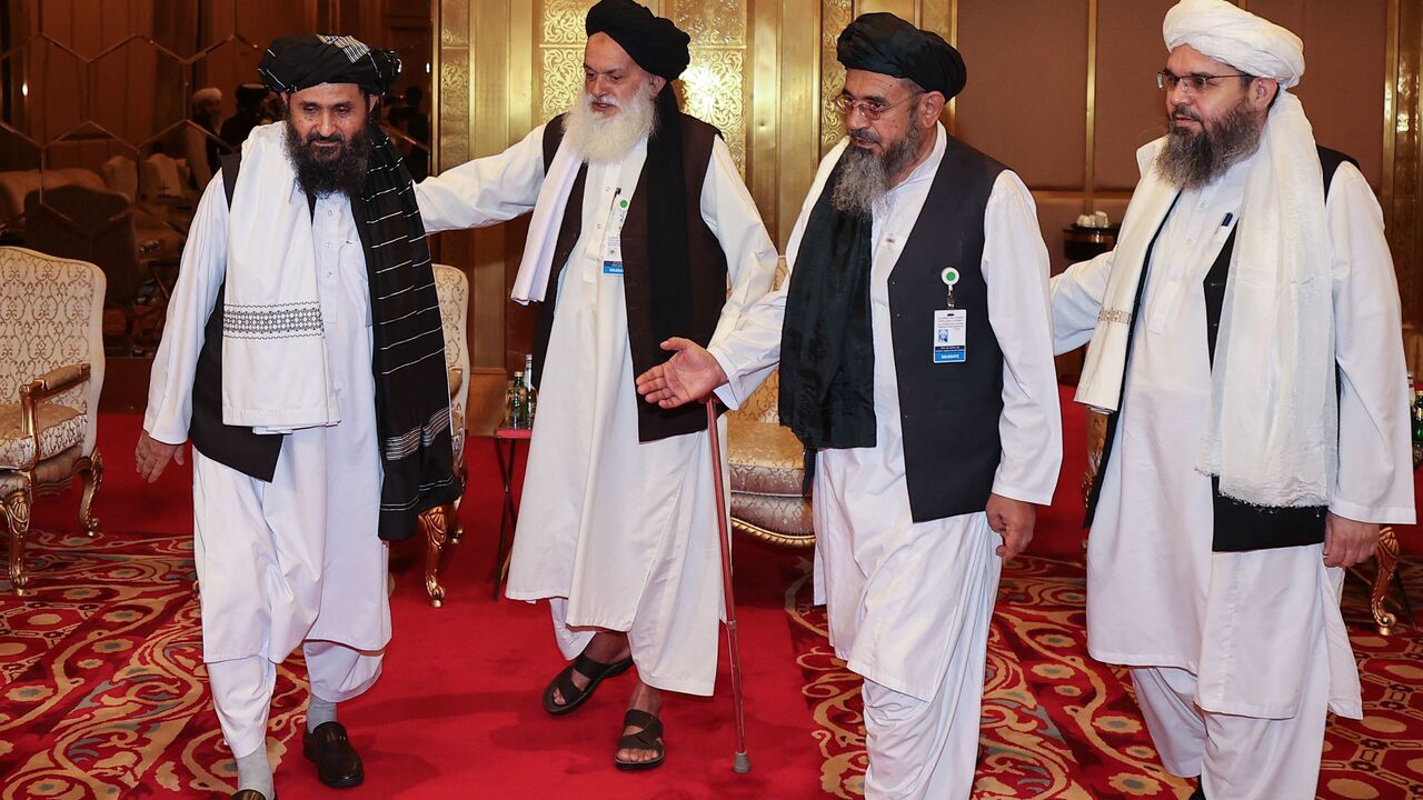 A delgation of Afghanistan's Taliban movement attends a session of the peace talks between the Afghan government and the Taliban in the Qatari capital Doha, on July 17, 2021. (Photo by KARIM JAAFAR / AFP) (Photo by KARIM JAAFAR/AFP via Getty Images)