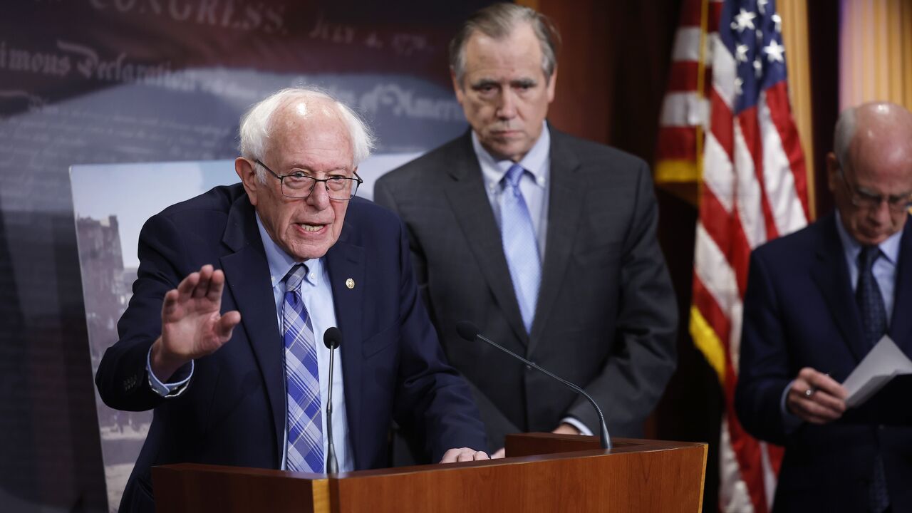 US Sen. Bernie Sanders, joined by fellow US Sens. Chris Van Hollen, Jeff Merkley and Peter Welch, listens to a question at a news conference on restricting arms sales to Israel at the US Capitol on Nov. 19, 2024, in Washington, DC.