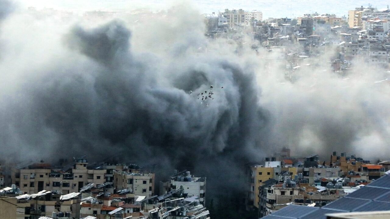 Smoke rises from the site of an Israeli air strike in Beirut's southern suburbs