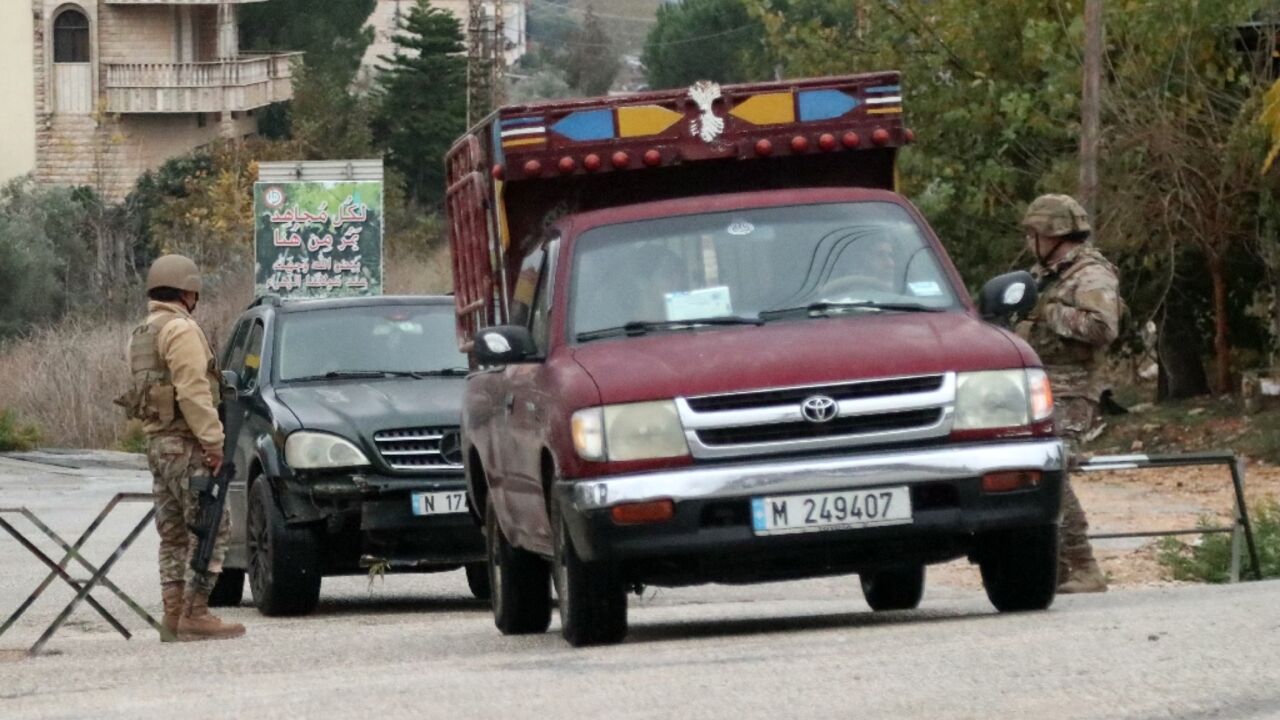 Lebanese army soldiers man a checkpoint in southern Lebanon's Marjayoun area after a ceasefire between Israel and Hezbollah took effect