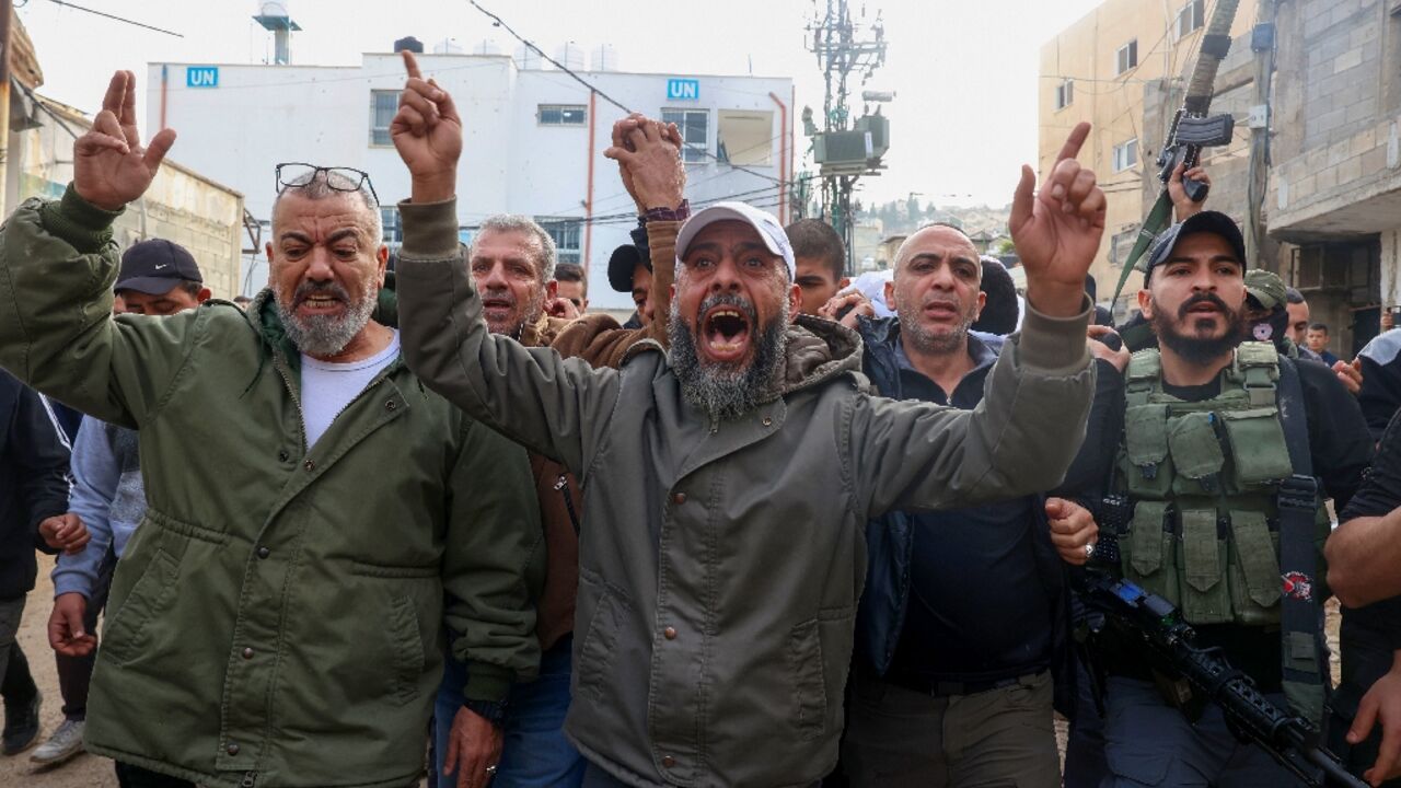 Mourners at the funeral of 19-year-old Rahbi Shalabi, killed during clashes between Palestinian security forces and militants