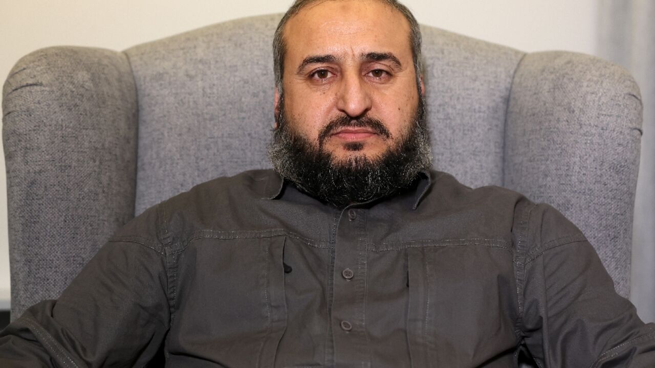 Murhaf Abu Qasra, a former agronomist, has led the armed wing of Syria's Islamist group Hayat Tahrir al-Sham