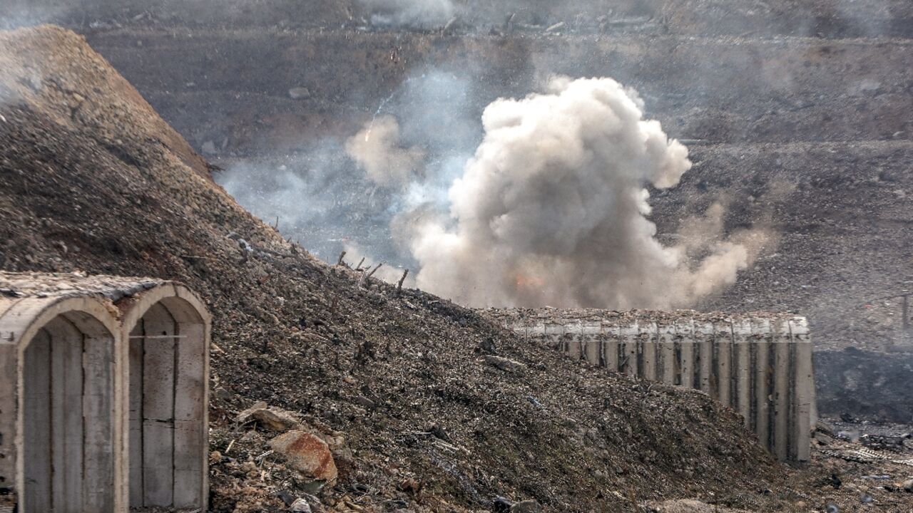 Several hours after a Syrian bunker complex outside the port of Tartus was hit in a suspected Israeli strike damaged munitions continued to explode Several hours after a Syrian bunker complex outside the port of Tartus was hit in a suspected Israeli strike damaged munitions continued to explode