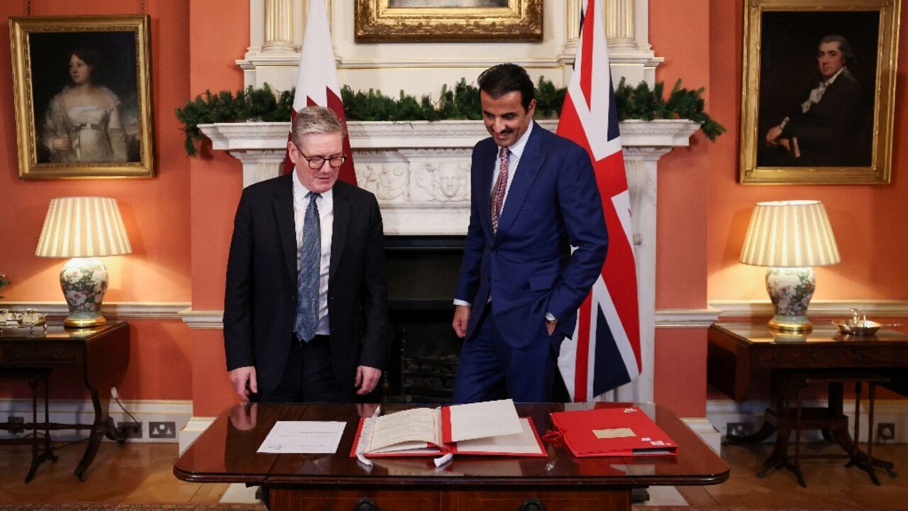 Britain's Prime Minister Keir Starmer (L) hosted Qatar's emir Sheikh Tamim bin Hamad al-Thani (R) in Downing Street