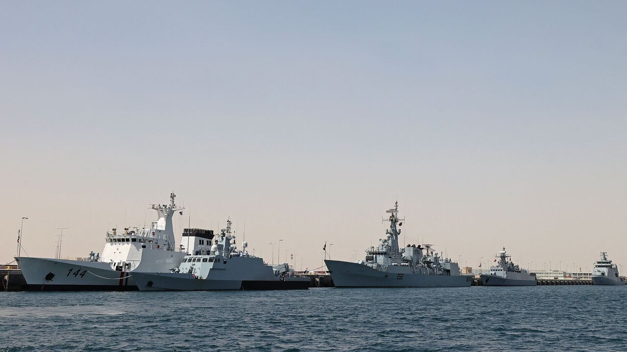 A general view shows warships docked at Hamad Port during the Doha International Maritime Defence Exhibition & Conference (DIMDEX), in the Qatari capital Doha on March 20, 2022.