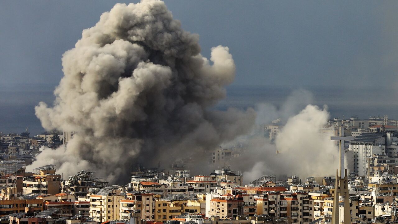 Smoke rises from the site of Israeli airstrikes that targeted Beirut's southern suburbs on Nov. 25, 2024, amid the ongoing war between Israel and Hezbollah. 