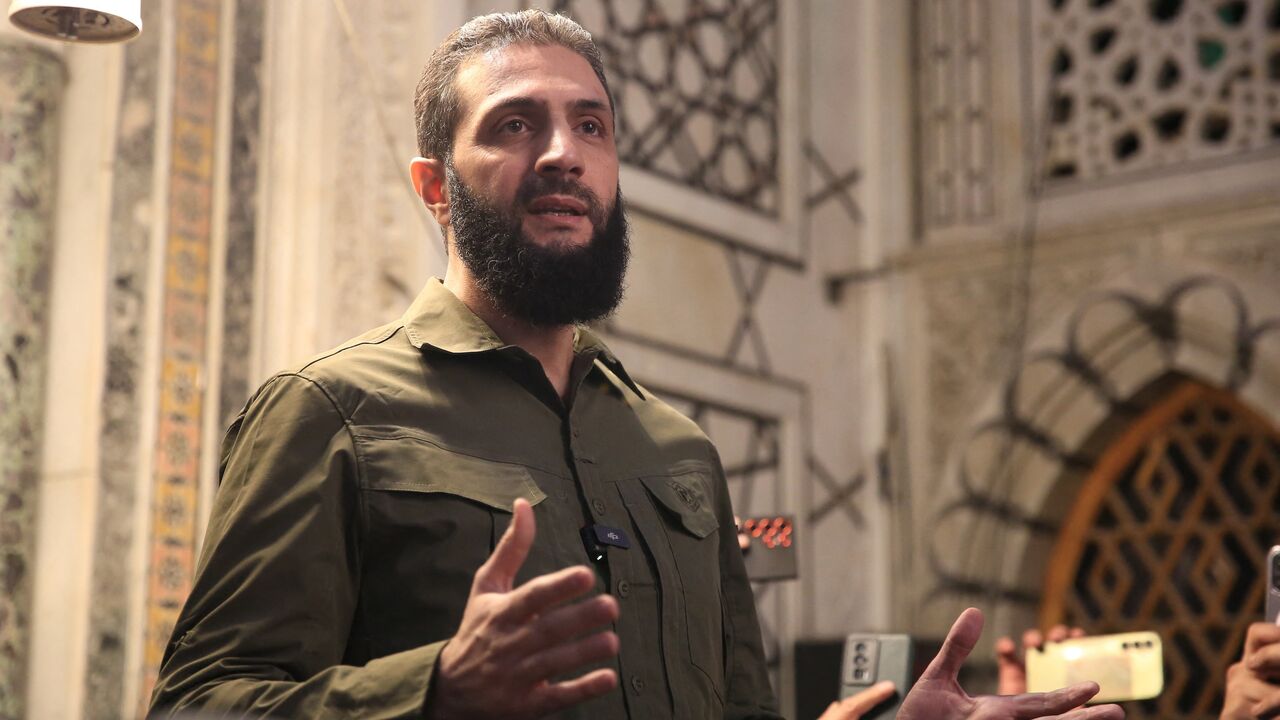 Abu Mohammed al-Jolani addresses a crowd at the capital's landmark Umayyad Mosque on Dec. 8, 2024.