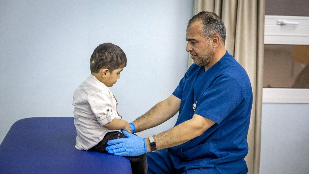 A doctor in Abu Dhabi cares for a Palestinian child injured in the Gaza Strip during the war between Israel and Hamas A doctor in Abu Dhabi cares for a Palestinian child injured in the Gaza Strip during the war between Israel and Hamas