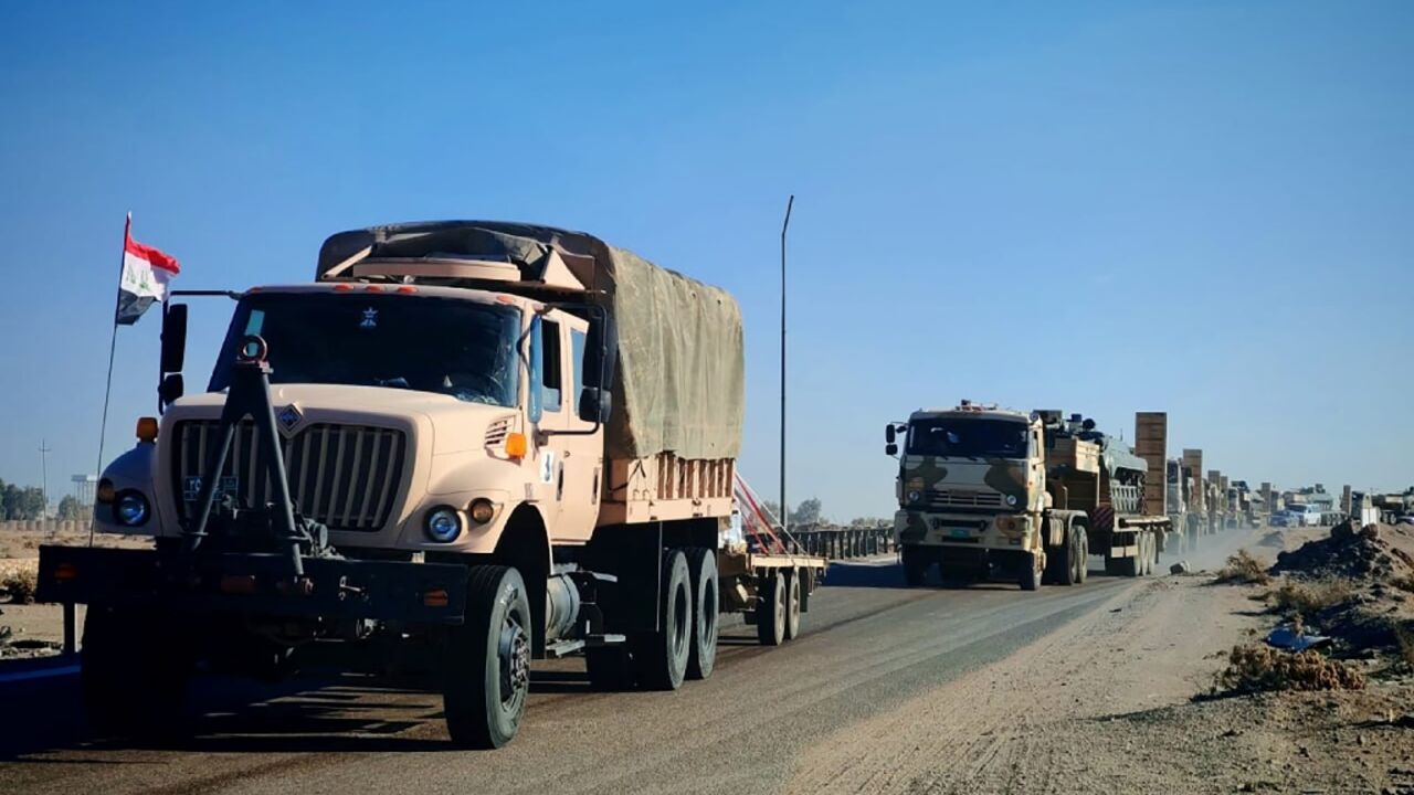 An Iraqi defence ministry picture shows military equipment being transported towards the border with Syria