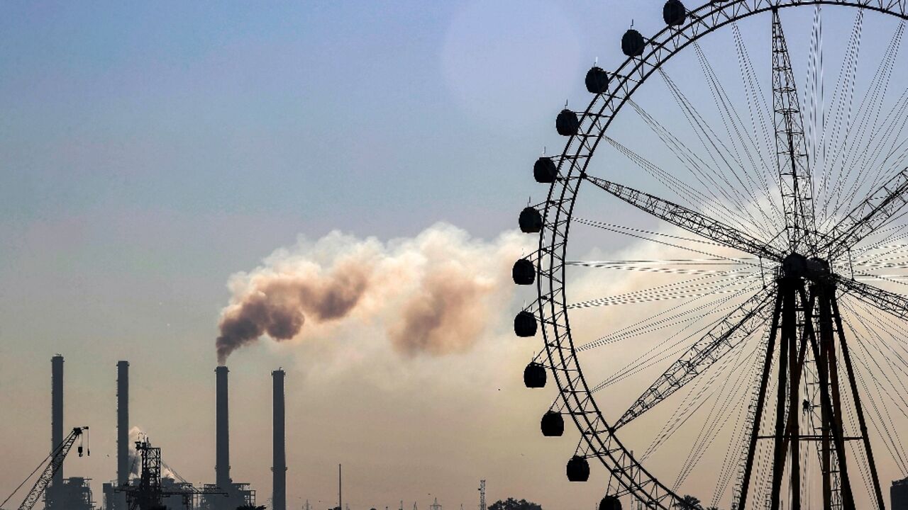 Smoke belches from the Dora power station, one of several plants that residents blame for poor air quality in Baghdad