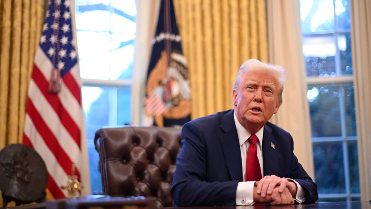 US President Donald Trump speaks to journalists in the Oval Office of the White House in Washington, DC, on January 30, 2025. 