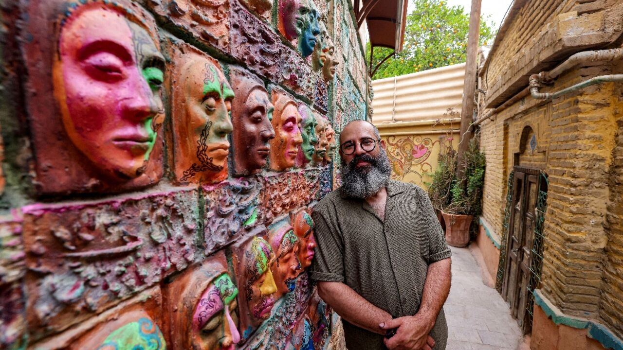 Adel Yazdi has over the years turned the walls of his old neighbourhood into a vivid visual tapestry 'telling the stories of the people living there'