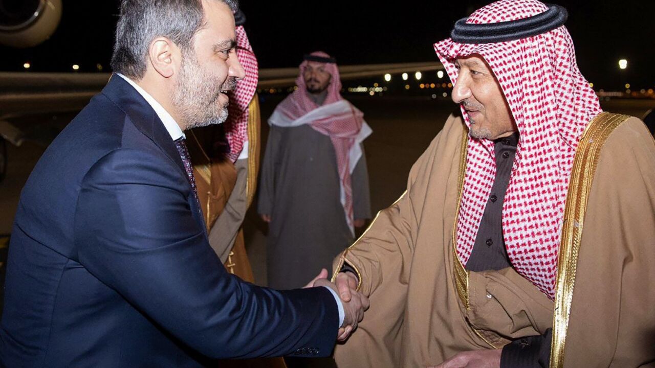 Syrian Foreign Minister Assaad al-Shibani (L) is welcomed to Saudi Arabia on his transitional government's first foreign visit since Islamist-led rebels toppled longtime ruler Bashar al-Assad last month Syrian Foreign Minister Assaad al-Shibani (L) is welcomed to Saudi Arabia on his transitional government's first foreign visit since Islamist-led rebels toppled longtime ruler Bashar al-Assad last month