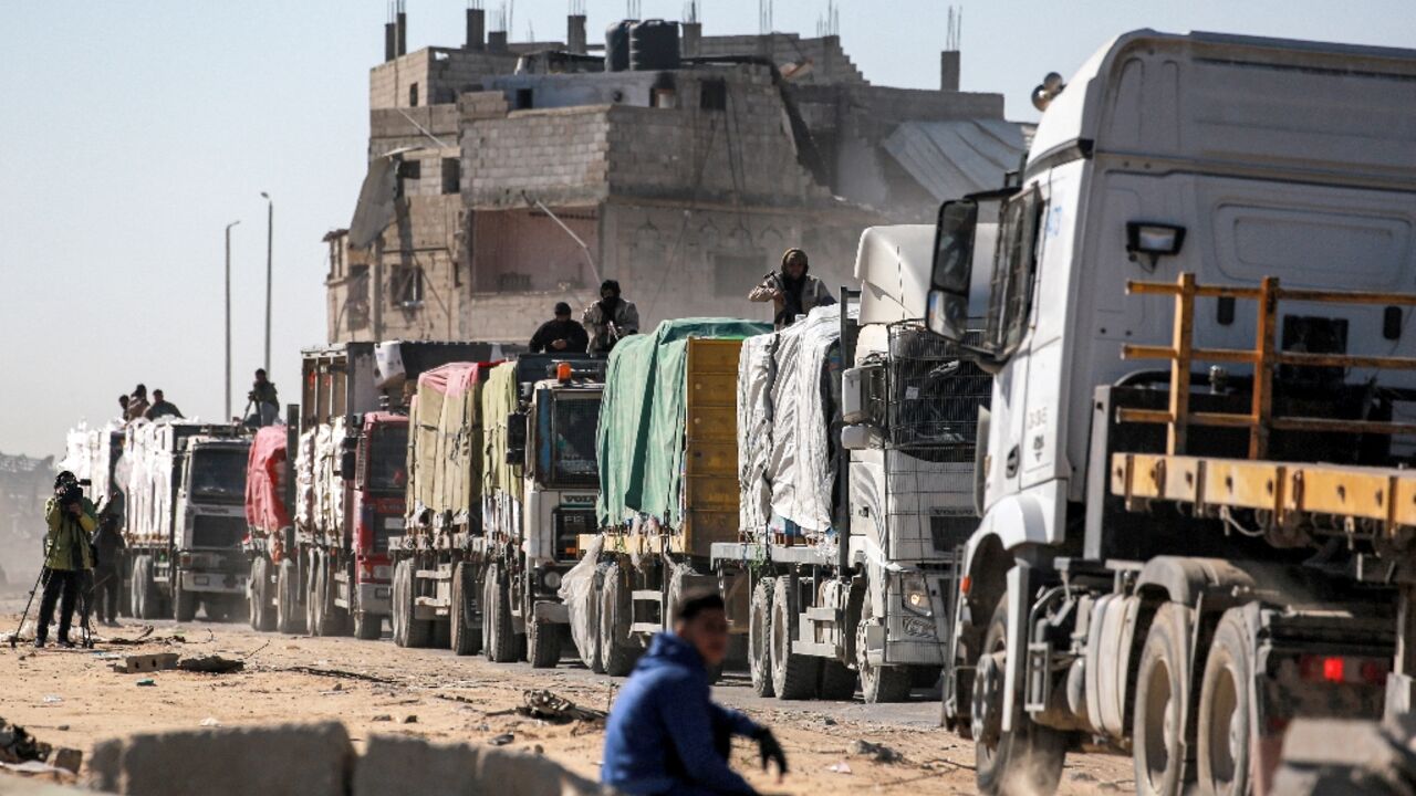 An aid convoy arrives in Rafah district in the southern Gaza Strip. An aid convoy arrives in Rafah district in the southern Gaza Strip.