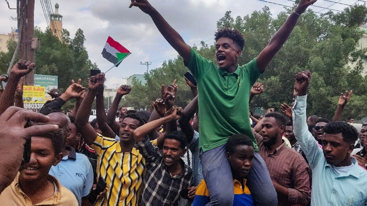 People in Sudan's de facto capital Port Sudan, which hosts the army-aligned government, take to the streets to celebrate the reported advance of Sudanese military forces and allied armed groups on the key Al-Jazira state capital, Wad Madani People in Sudan's de facto capital Port Sudan, which hosts the army-aligned government, take to the streets to celebrate the reported advance of Sudanese military forces and allied armed groups on the key Al-Jazira state capital, Wad Madani