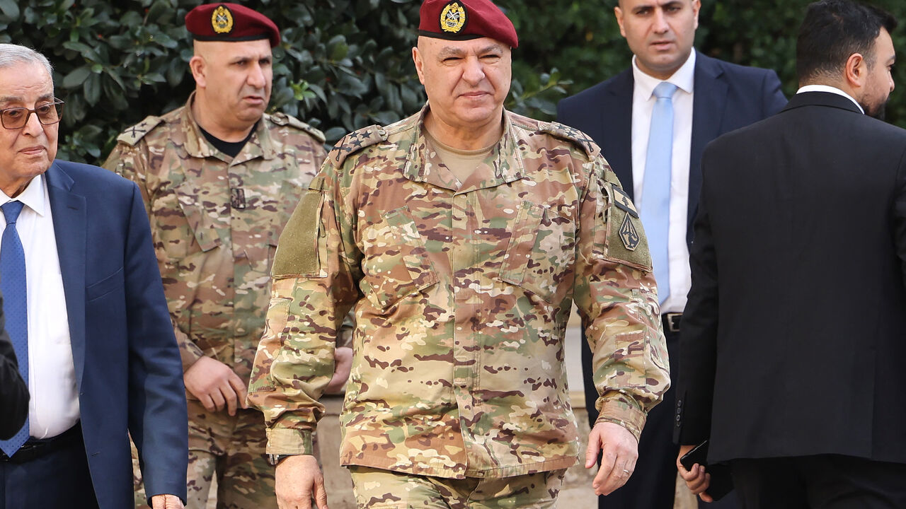 In this picture taken on Dec. 16, 2024, Lebanese army chief Joseph Aoun (C) walks toward the Grand Serail in Beirut.