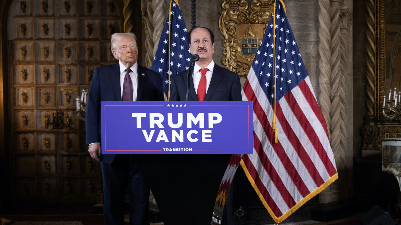 President-elect Donald Trump listens as DAMAC Properties CEO Hussain Sajwani speaks to members of the media during a press conference at the Mar-a-Lago Club on Jan. 7, 2025 in Palm Beach, Florida. 